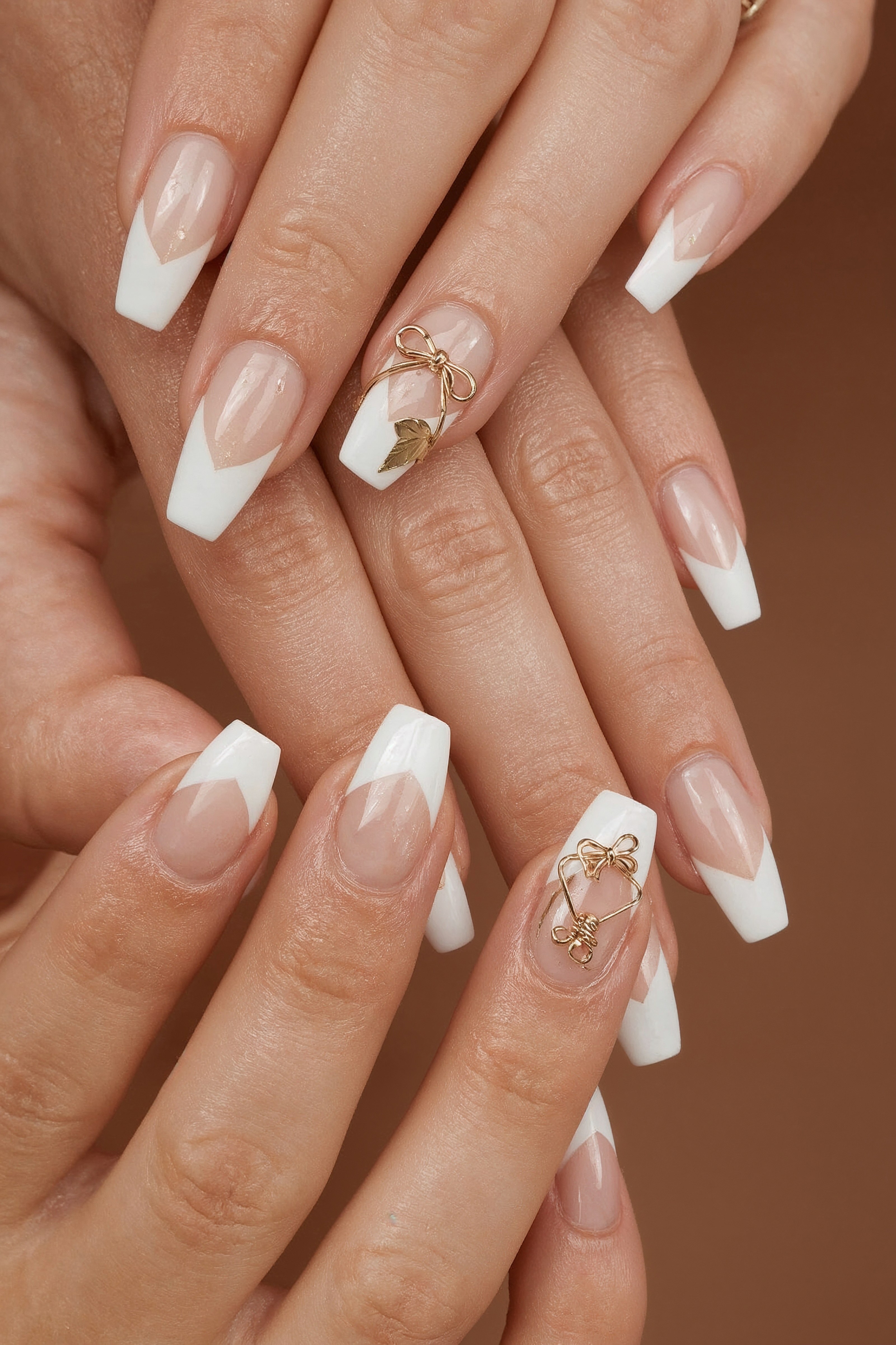 Gold Bow Almond Nails: The Ultimate Chic French Tip Look