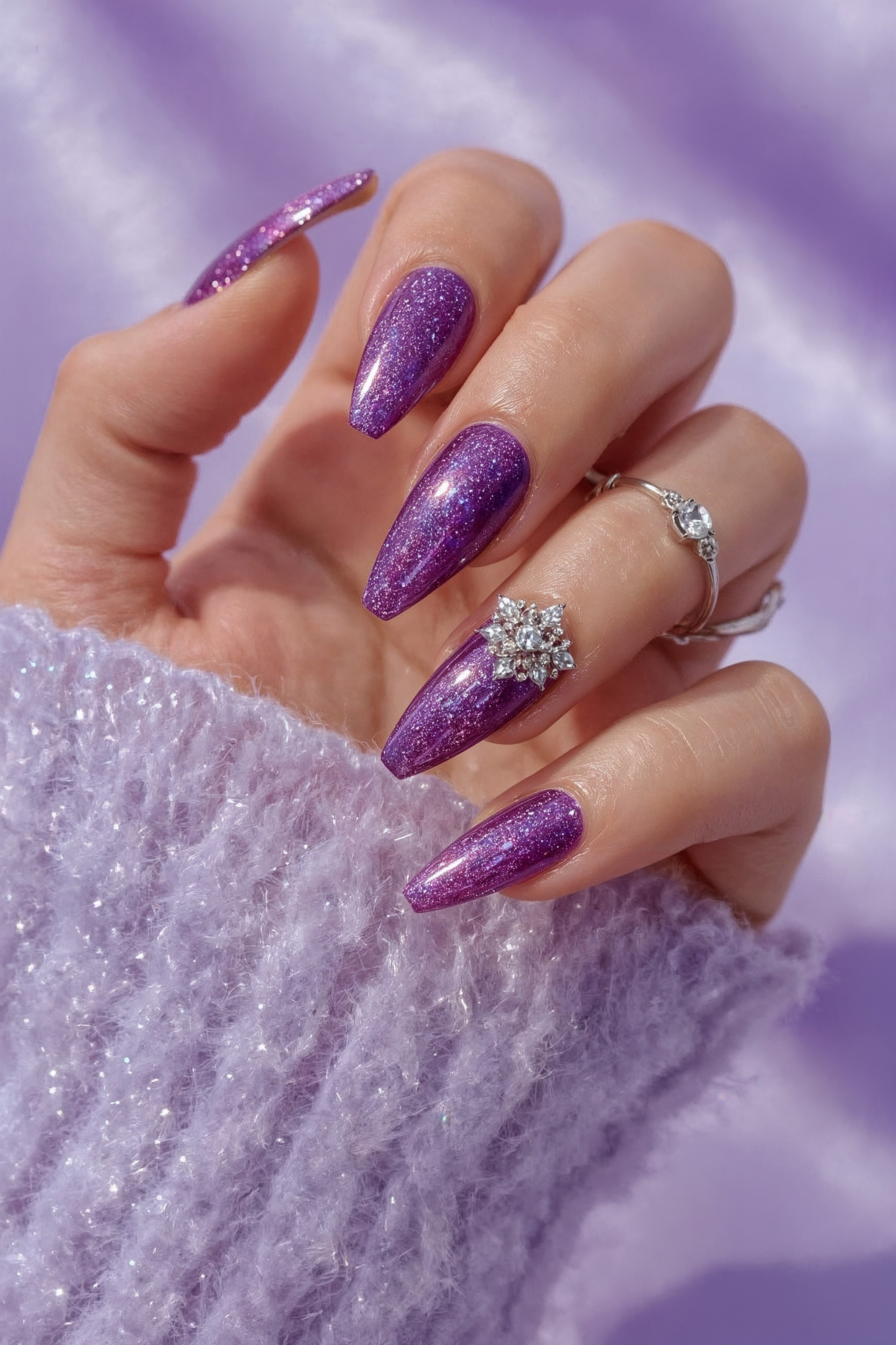 Glamorous Purple Chrome Almond Nails for Wedding Guests