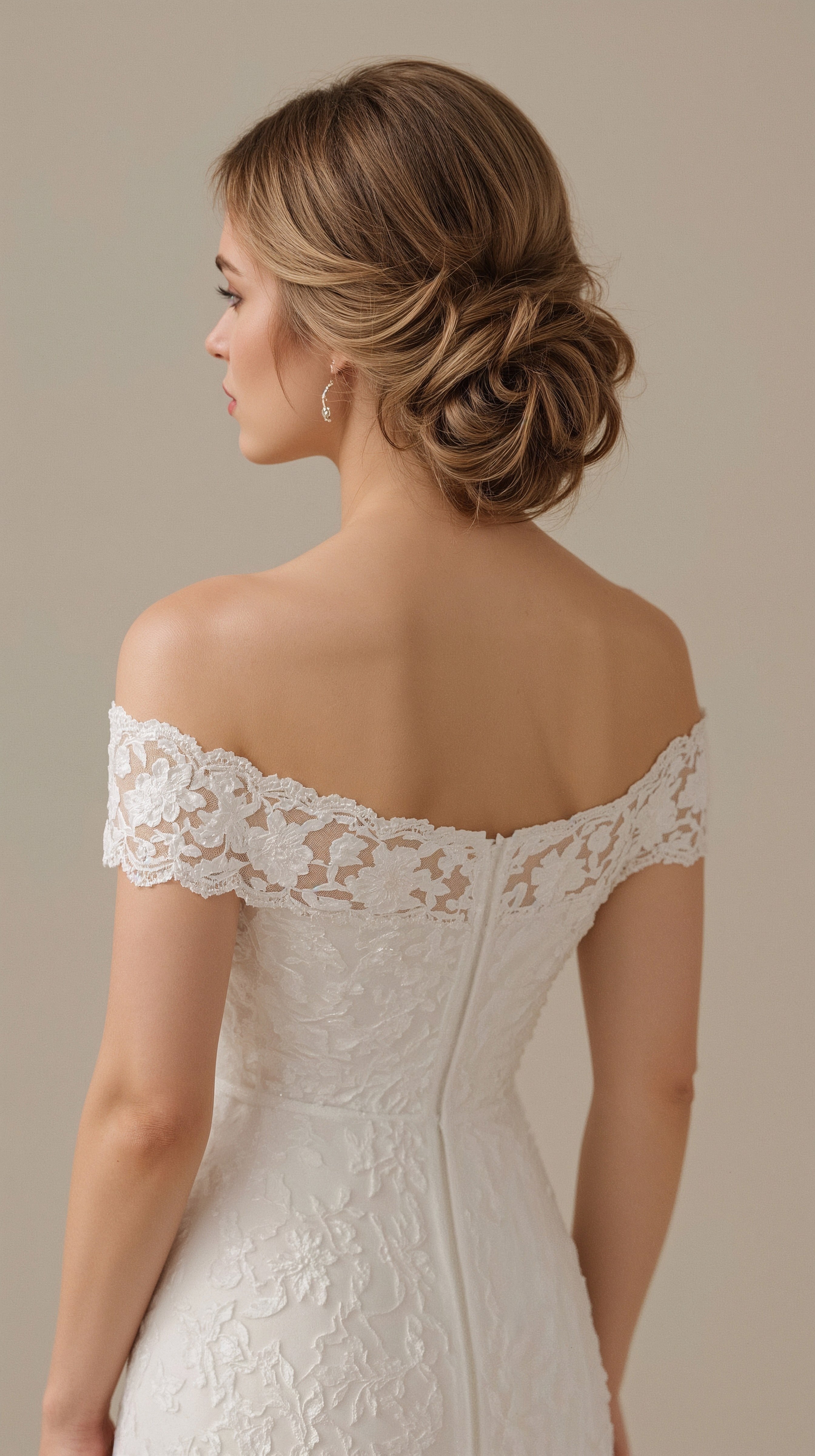 Glamorous Low Bun Updo: Sophisticated Bridal Hair Inspiration
